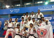Atlet judo Polri Bripda M. Alfiansyah Lubis berhasil merebut medali emas di kategori beregu campuran, Sabtu (14/09/24) di Gelanggang Universitas Syah Kuala, Banda Aceh.
