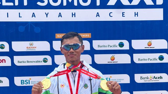 Denri Maulidzar Alghiffari Pedayung Jawa Bara berhasil memborong tiga medali emas sekaligus di hari yang sama pada cabor dayung rowing PON XXI Aceh- Sumatera Utara, Jumat (13/9/2024).